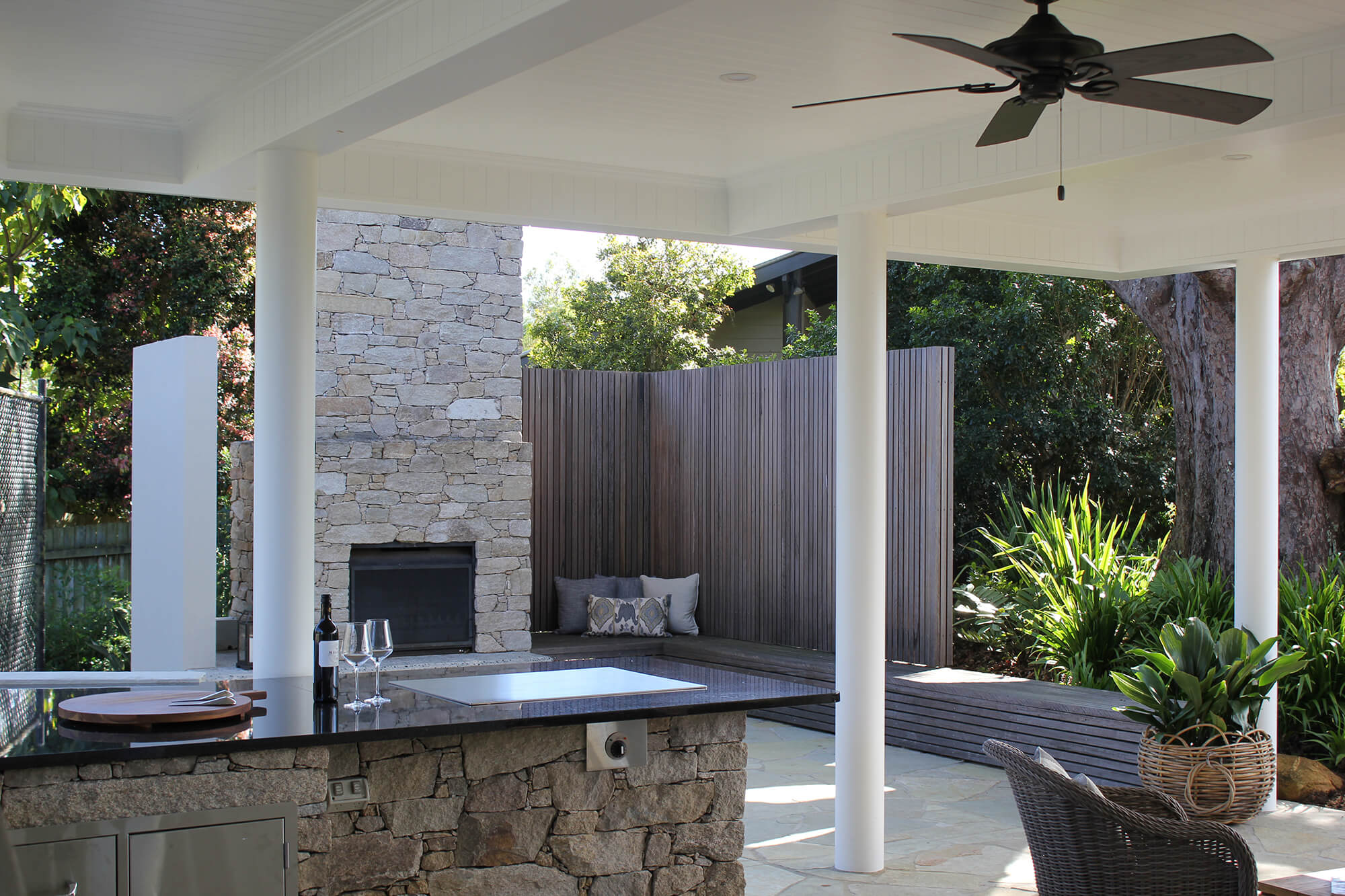 the gap custom made alpine stone clad teppinyaki plate with fireplace and timber screening