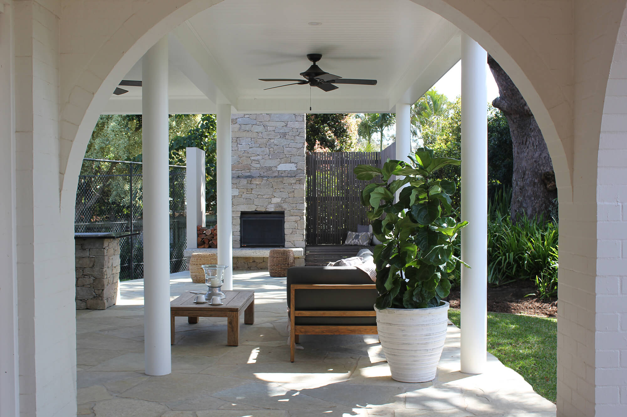 the gap outdoor entertaining area with arch and columns