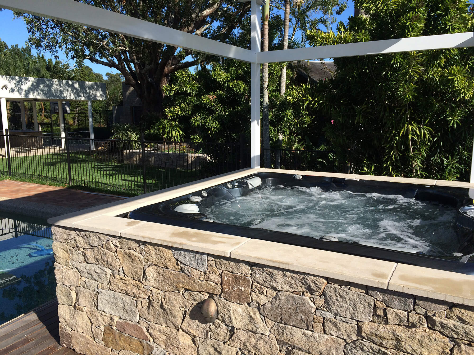 redcliffe custom made alpine stone spa enclosure and gazebo